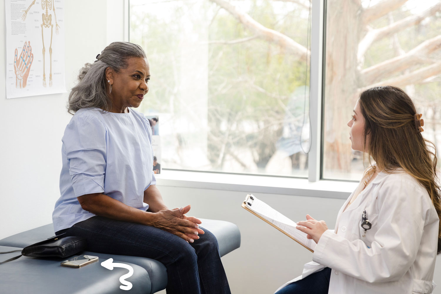 Young woman using Joyn Healthcare during a doctor visit